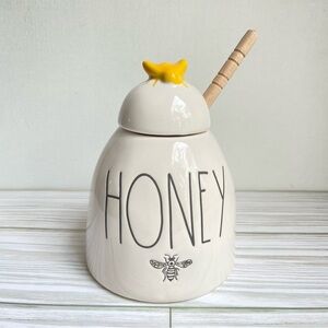 Rae Dunn Honey Pot with wooden dipper and yellow honey bee on lid by Magenta